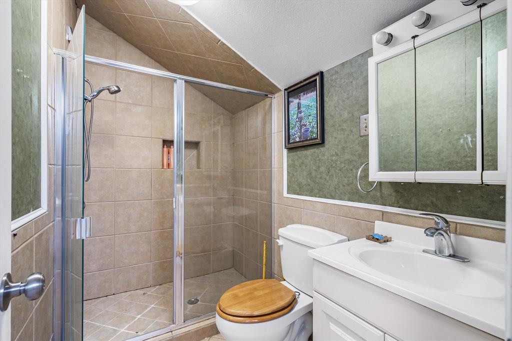 163 Granada Square Canton, TX 75103 - Photo 19 of 35 a bathroom with a sink toilet and shower