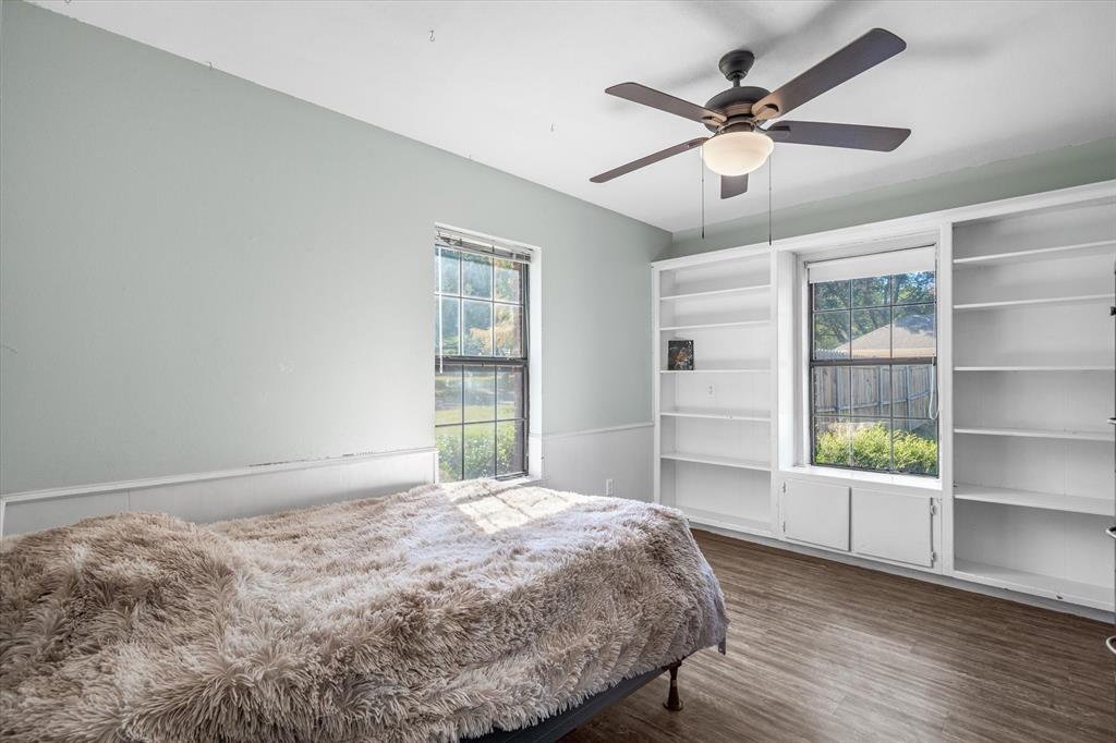 163 Granada Square Canton, TX 75103 - Photo 29 of 35 a bedroom with a bed and a window