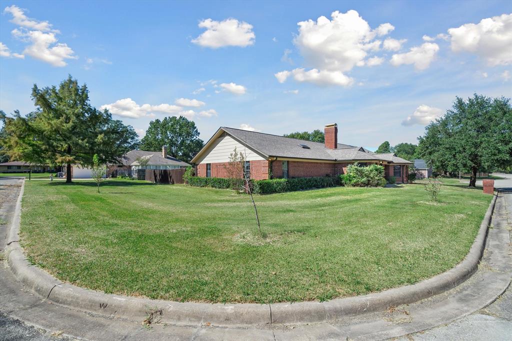 163 Granada Square Canton, TX 75103 - Photo 6 of 35 a house view with a garden space