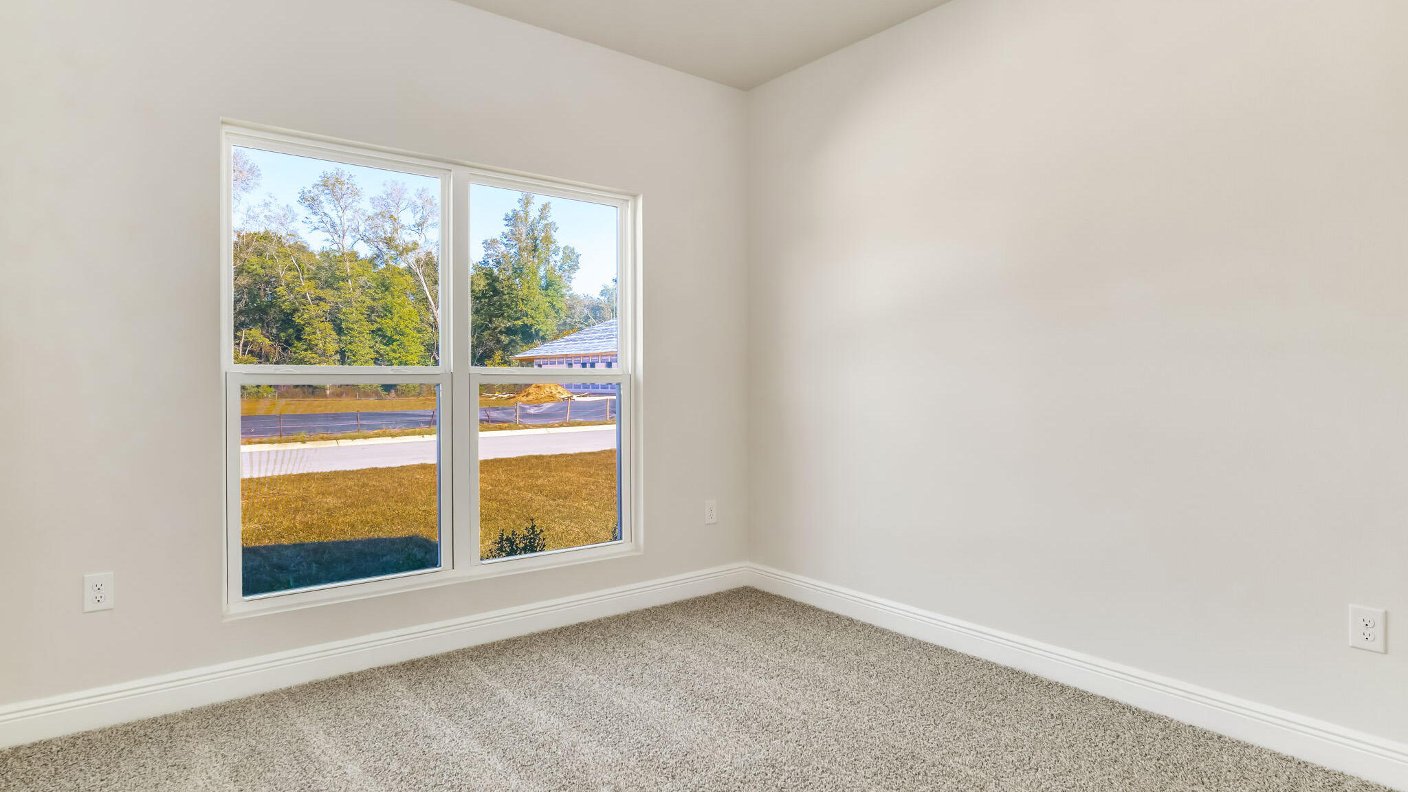 5619 Thatcher Road Crestview, FL 32539 - Photo 32 of 32 a view of an empty room with a window