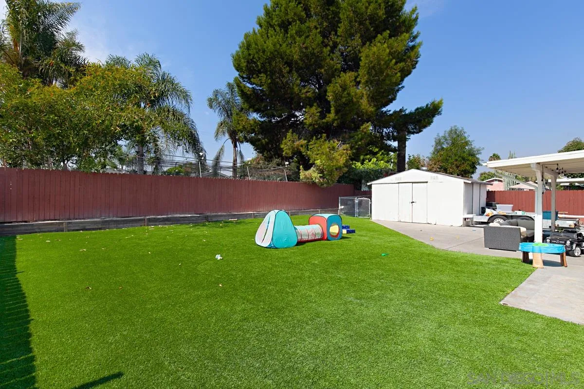 612 Broadview Street Spring Valley, CA 91977 - Photo 14 of 15 a view of a backyard with a garden and fire pit