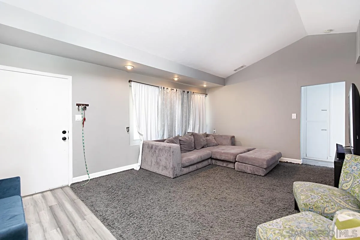 612 Broadview Street Spring Valley, CA 91977 - Photo 7 of 15 a living room with furniture and a large window