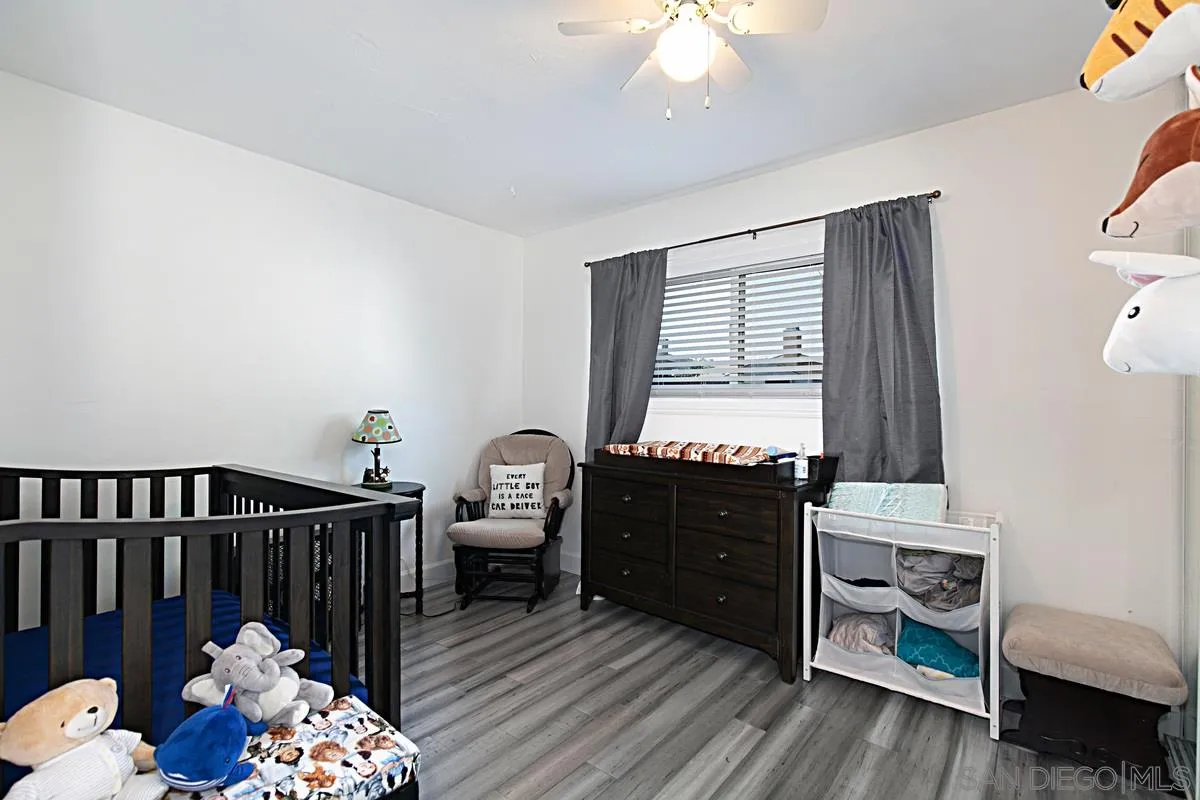 612 Broadview Street Spring Valley, CA 91977 - Photo 10 of 15 a bedroom with furniture and a window