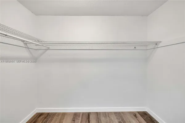 a view of a room with racks on the wall