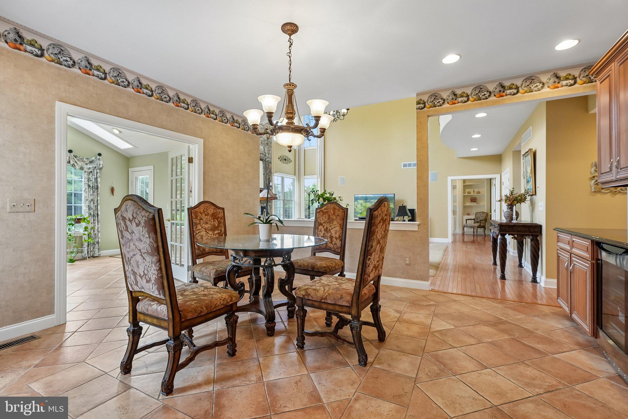 1 Baker Way Pennington, NJ 08534 - Photo 19 of 77 a view of a dining room with furniture and wooden floor