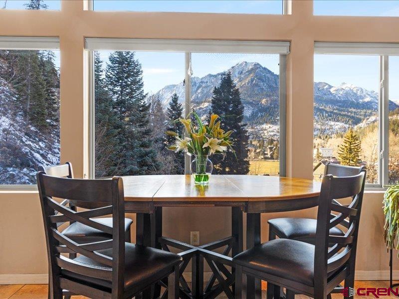 1271 Main Street Ouray, CO 81427 - Photo 17 of 45 a view of a dining room with furniture window and outside view