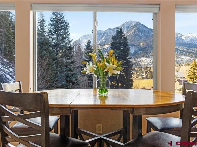 a view of a dining table with furniture