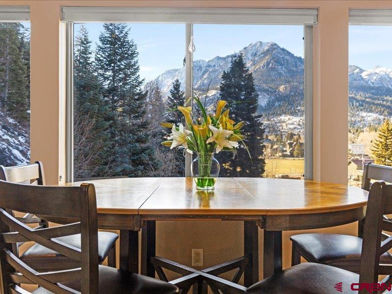 1271 Main Street Ouray, CO 81427 - Photo 18 of 45 a view of a dining table with furniture