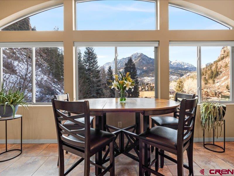 1271 Main Street Ouray, CO 81427 - Photo 19 of 45 a dining room with furniture and window
