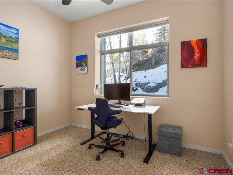 1271 Main Street Ouray, CO 81427 - Photo 31 of 45 a view of a workspace with furniture and a window