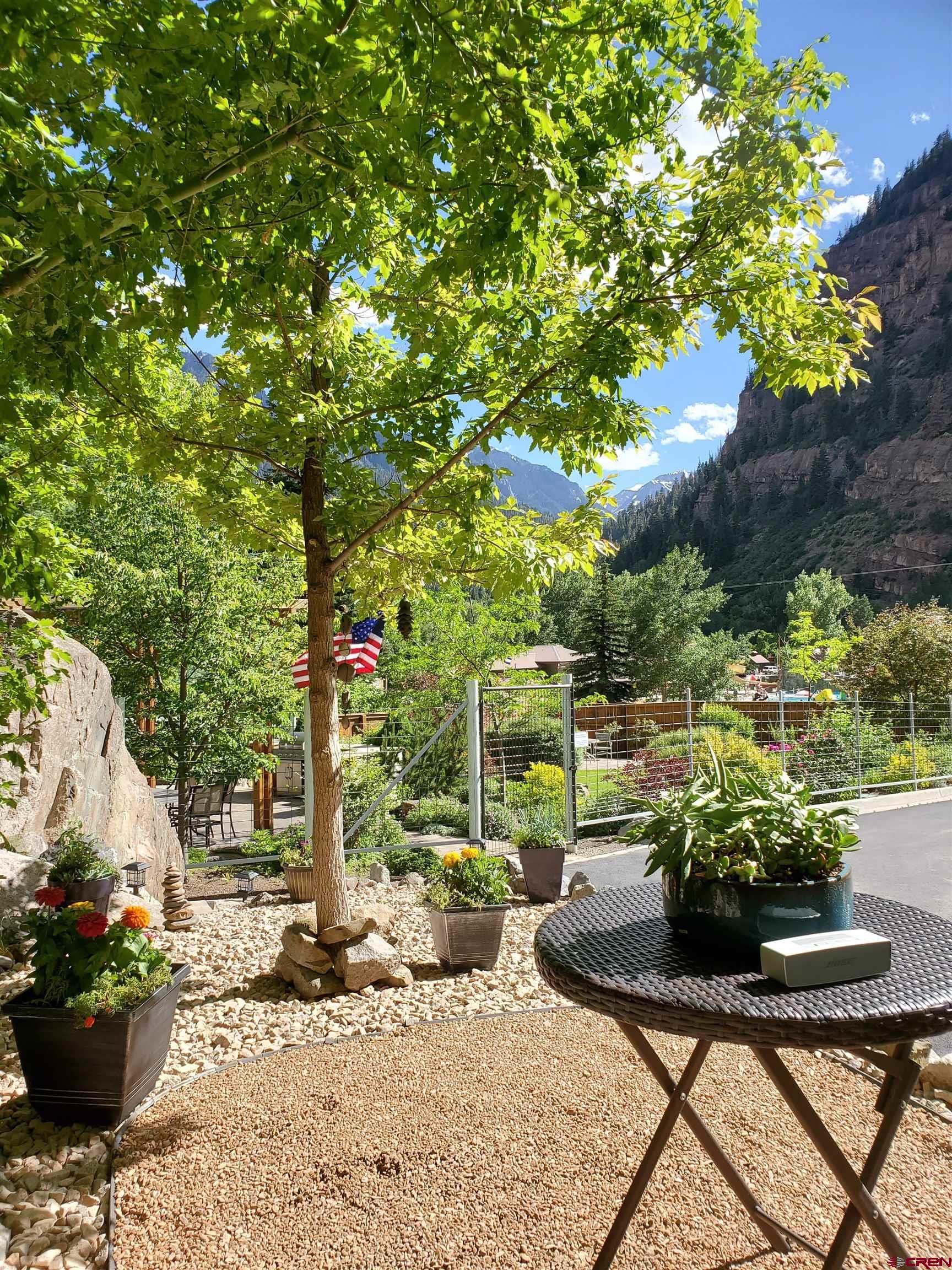 1271 Main Street Ouray, CO 81427 - Photo 39 of 45 a view of a backyard with plants and a garden