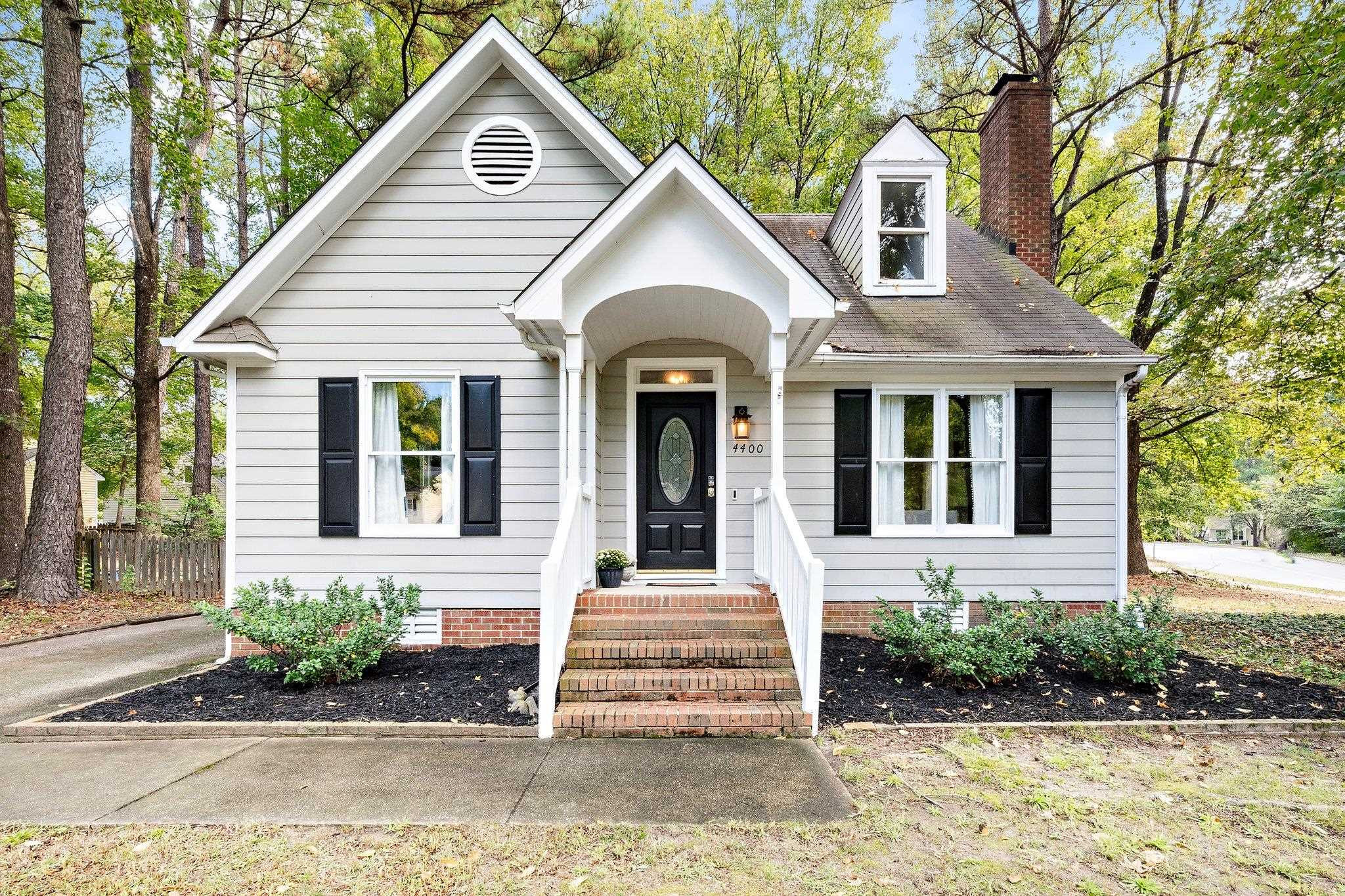 4400 Liverpool Lane Raleigh, NC 27604 - Photo 1 of 34 a front view of a house with garden