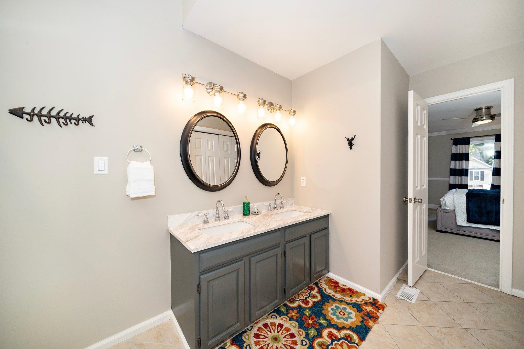 4400 Liverpool Lane Raleigh, NC 27604 - Photo 14 of 34 a bathroom with a sink and a mirror
