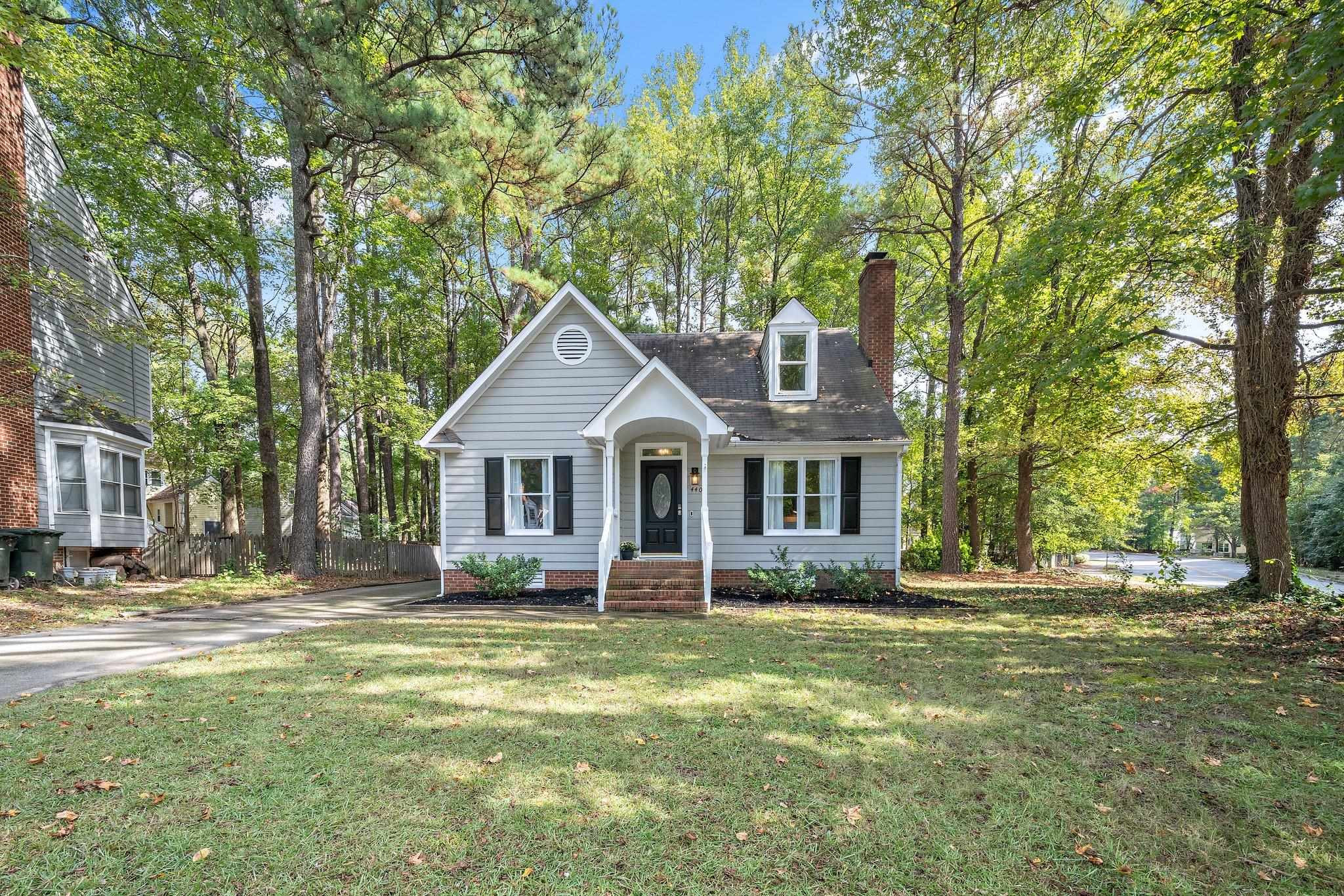 4400 Liverpool Lane Raleigh, NC 27604 - Photo 2 of 34 a front view of a house with a yard