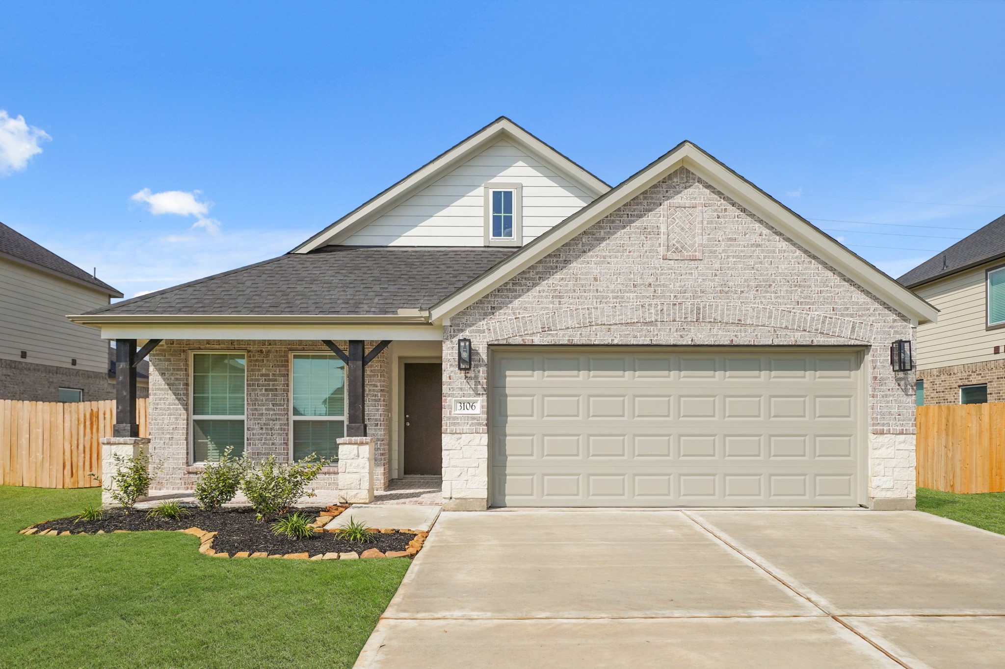 3106 Boulder Ridge Drive Rosenberg, TX 77471 - Photo 23 of 34 a front view of a house with a yard and garage
