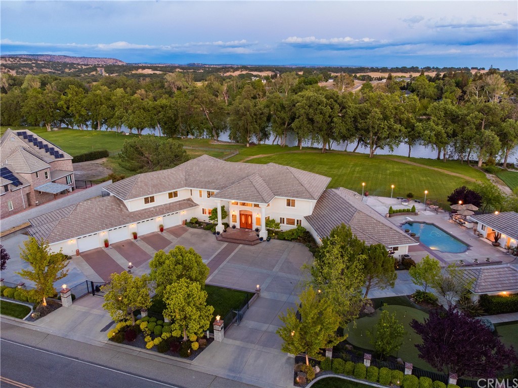an aerial view of a house with a garden