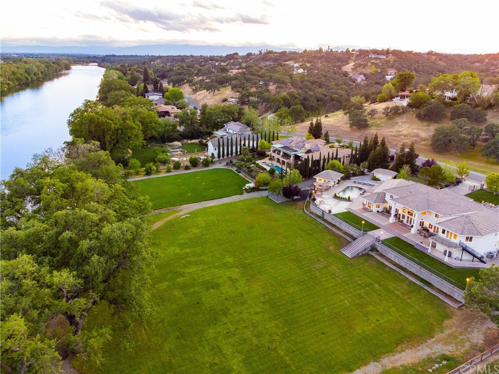 22595 Adobe Road Red Bluff, CA 96080 - Photo 13 of 71 a view of a lake with a mountain