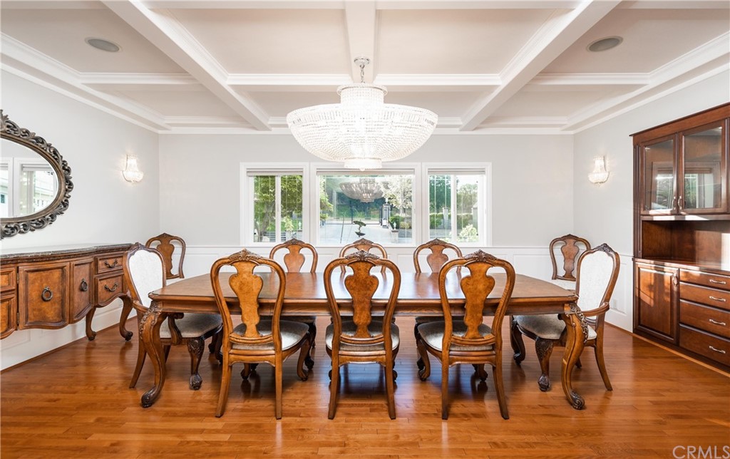 22595 Adobe Road Red Bluff, CA 96080 - Photo 35 of 71 a view of a dining room with furniture window and wooden floor
