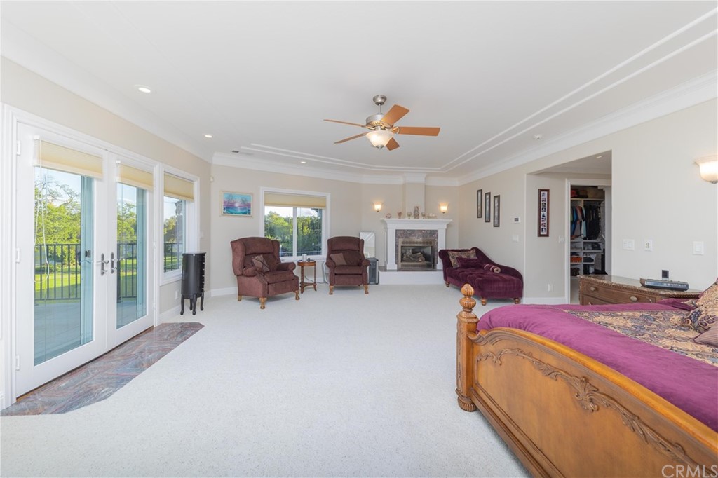 22595 Adobe Road Red Bluff, CA 96080 - Photo 55 of 71 a bed room with a bed and a chair