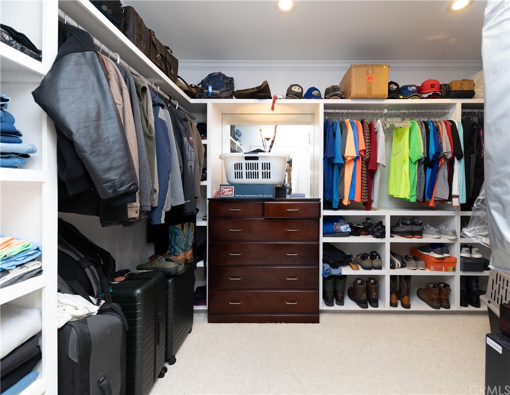 22595 Adobe Road Red Bluff, CA 96080 - Photo 61 of 71 a view of walk in closet with clothes and shoes