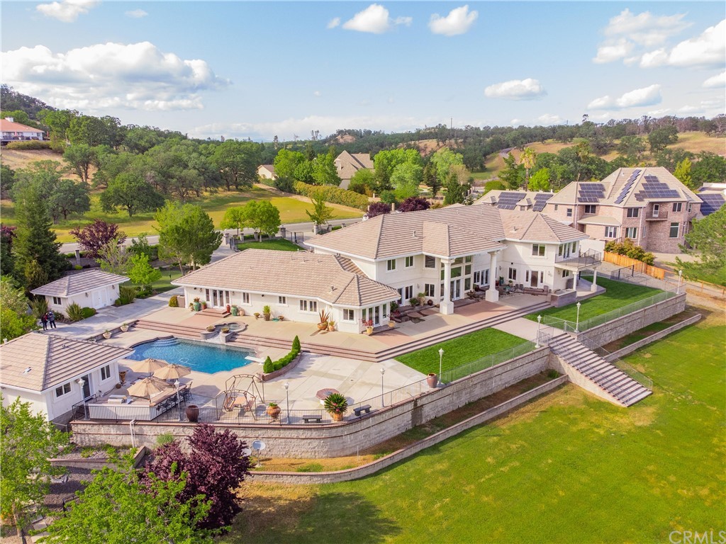 22595 Adobe Road Red Bluff, CA 96080 - Photo 9 of 71 an aerial view of residential houses with outdoor space