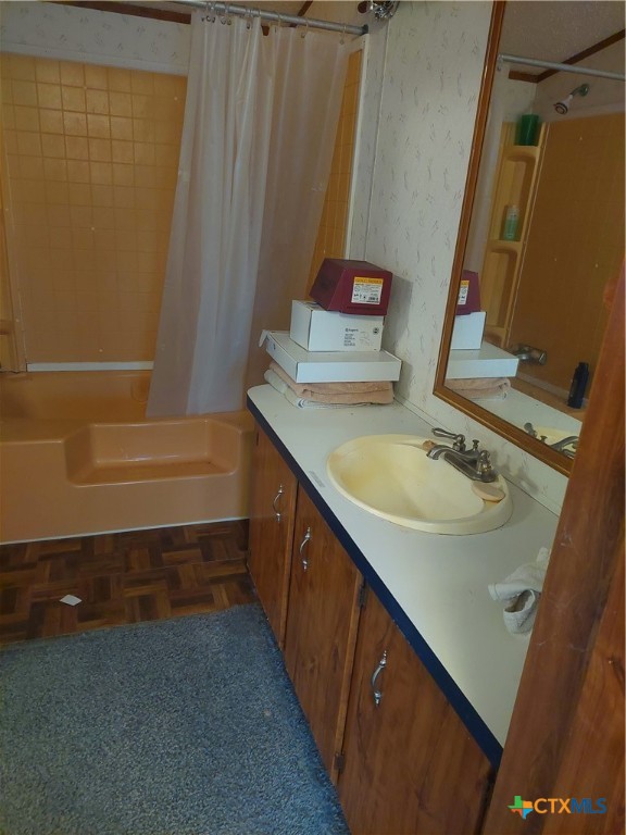 22159 Private Road 1080 Mathis, TX 78368 - Photo 7 of 12 a bathroom with a sink and a mirror