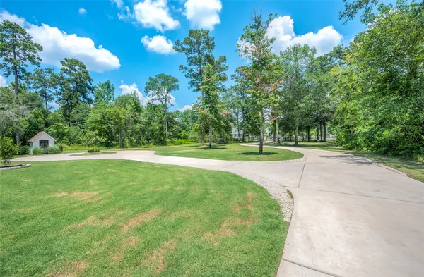 a view of a golf course with a lake