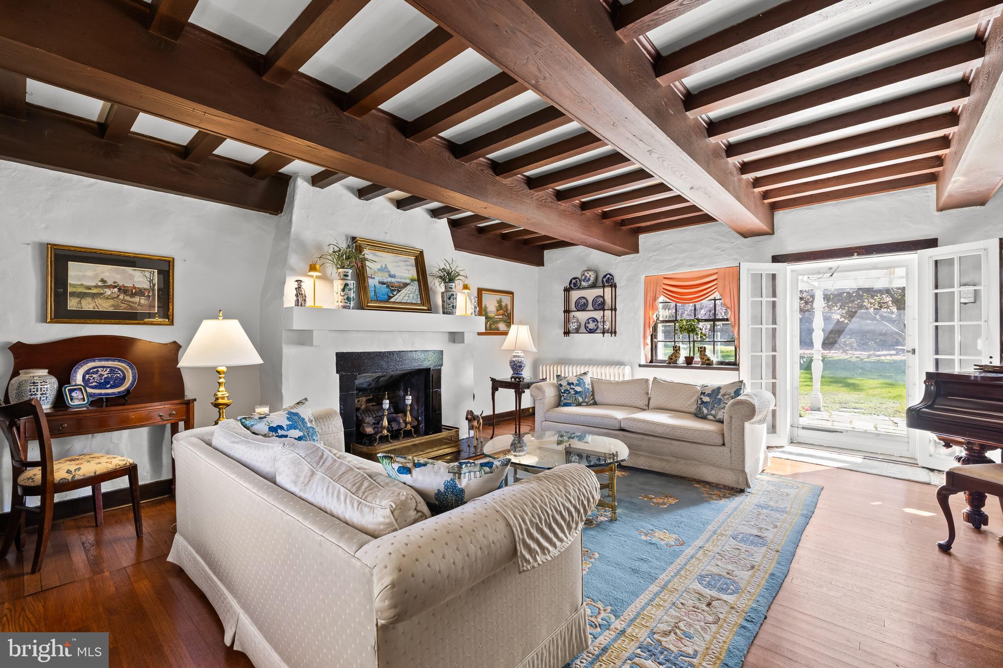 4309 Wendover Road Baltimore, MD 21218 - Photo 14 of 56 a living room with furniture and a fireplace