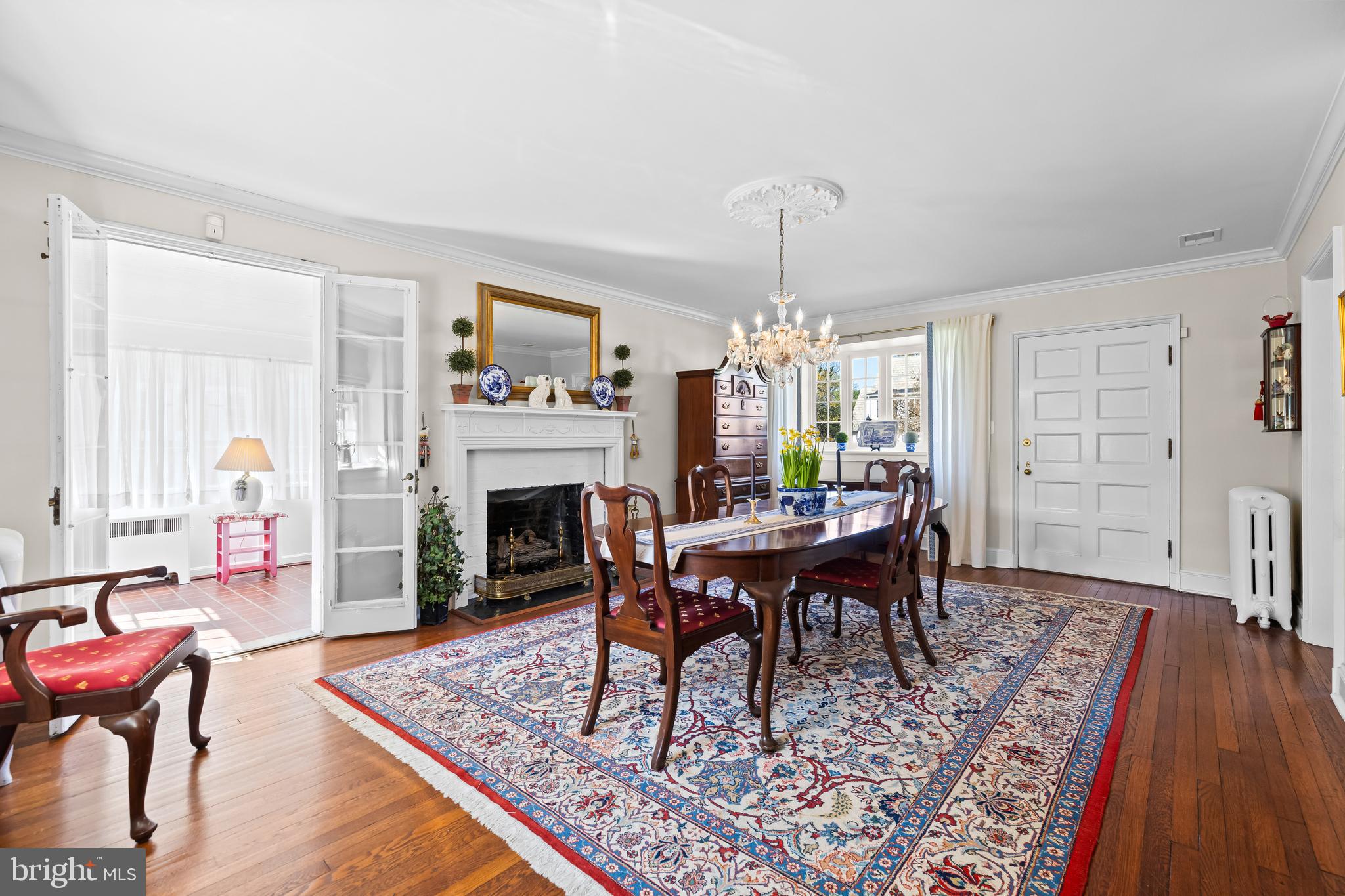 4309 Wendover Road Baltimore, MD 21218 - Photo 17 of 56 a view of a dining room with furniture window and wooden floor