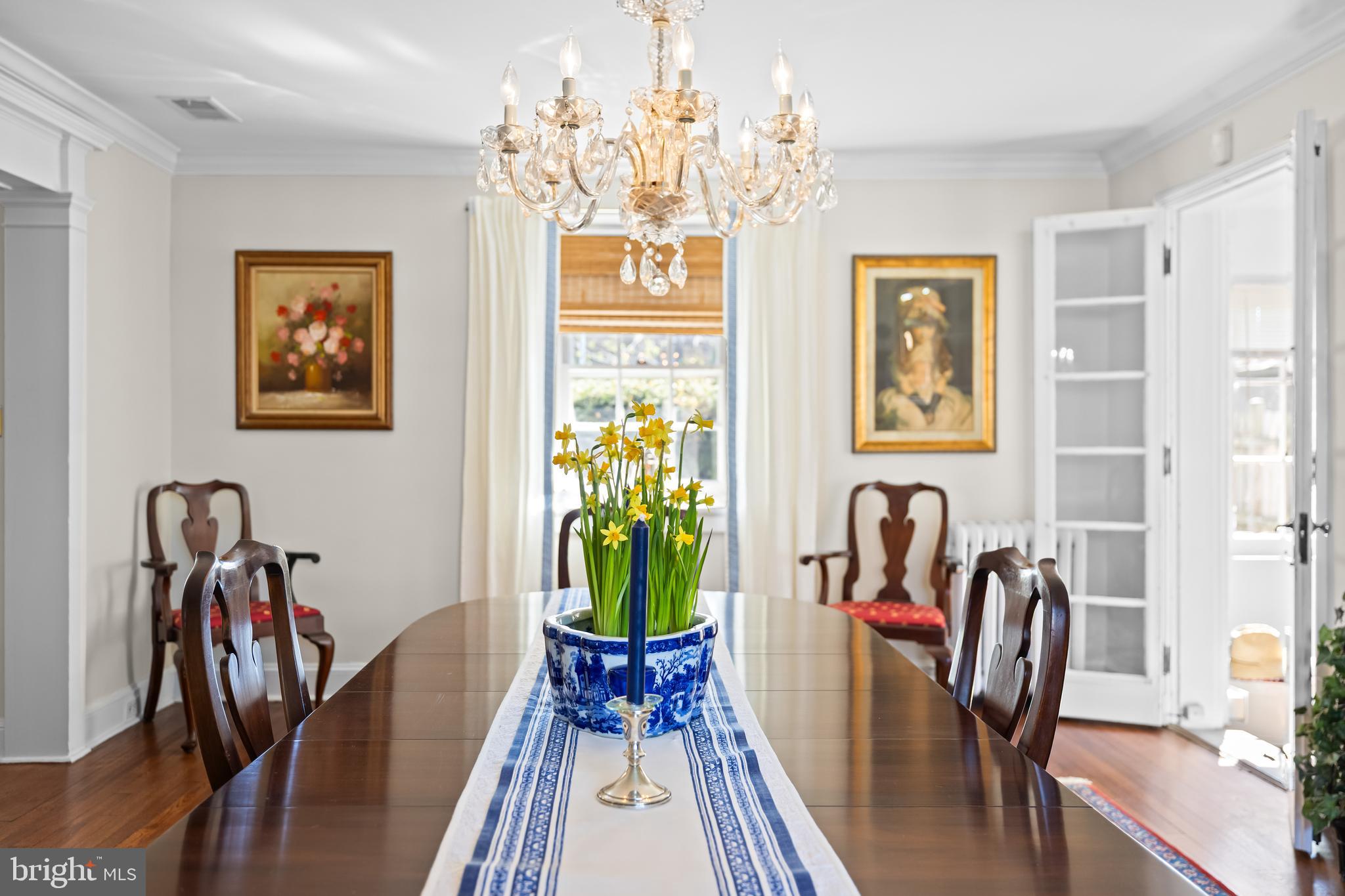 4309 Wendover Road Baltimore, MD 21218 - Photo 18 of 56 a view of a dining room with furniture window and wooden floor