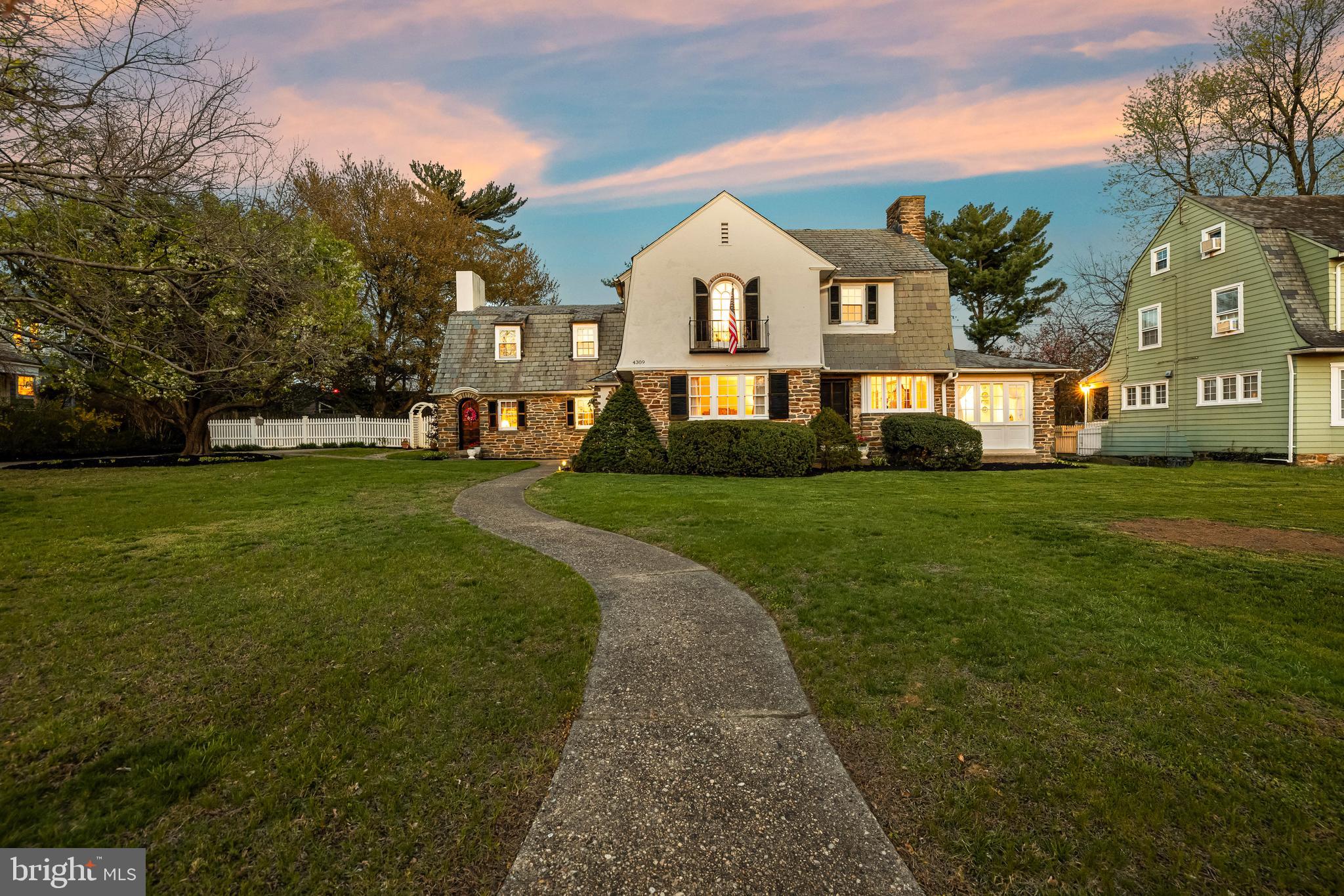 4309 Wendover Road Baltimore, MD 21218 - Photo 2 of 56 a front view of a house with garden