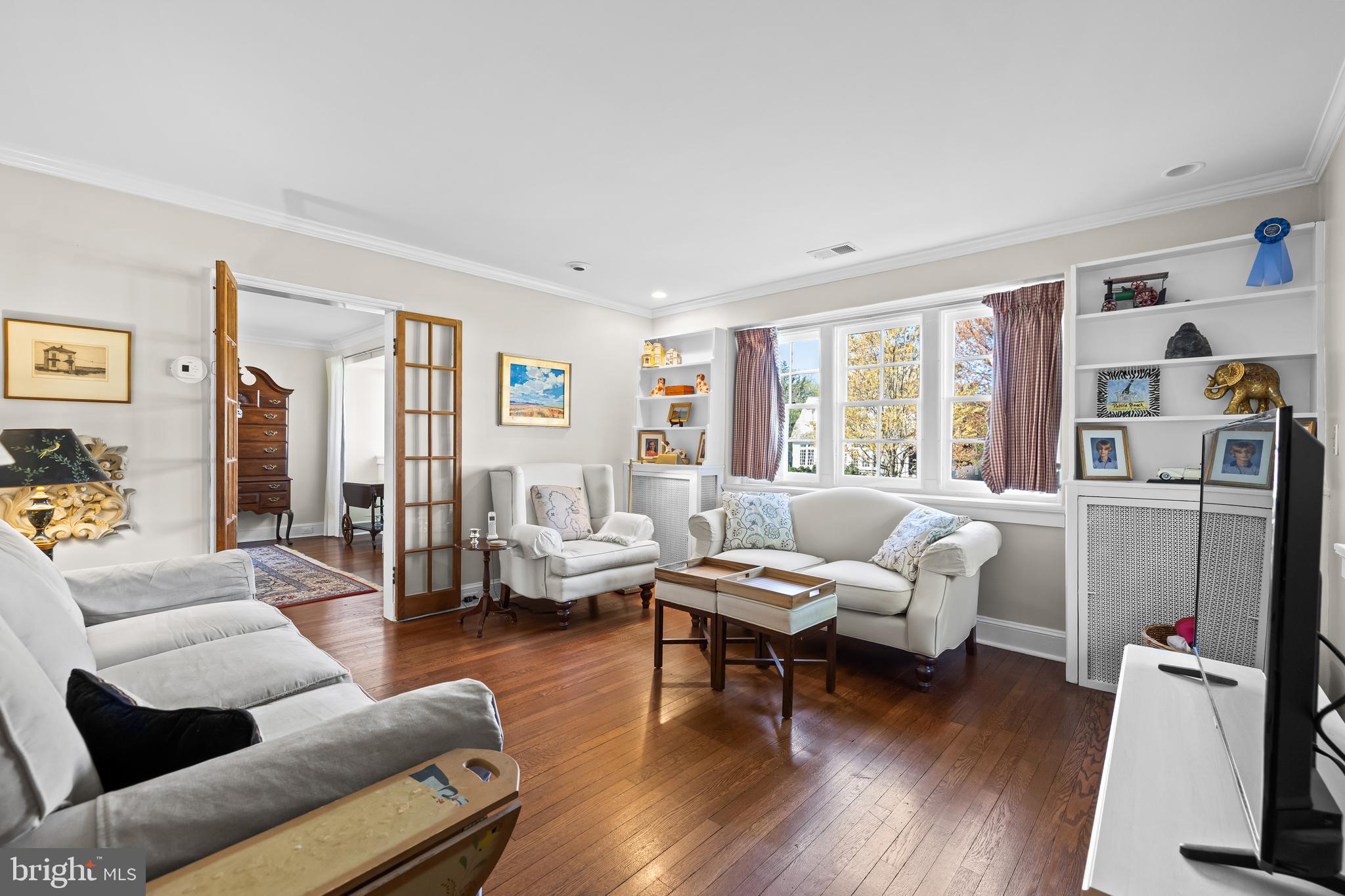 4309 Wendover Road Baltimore, MD 21218 - Photo 21 of 56 a living room with furniture and a wooden floor