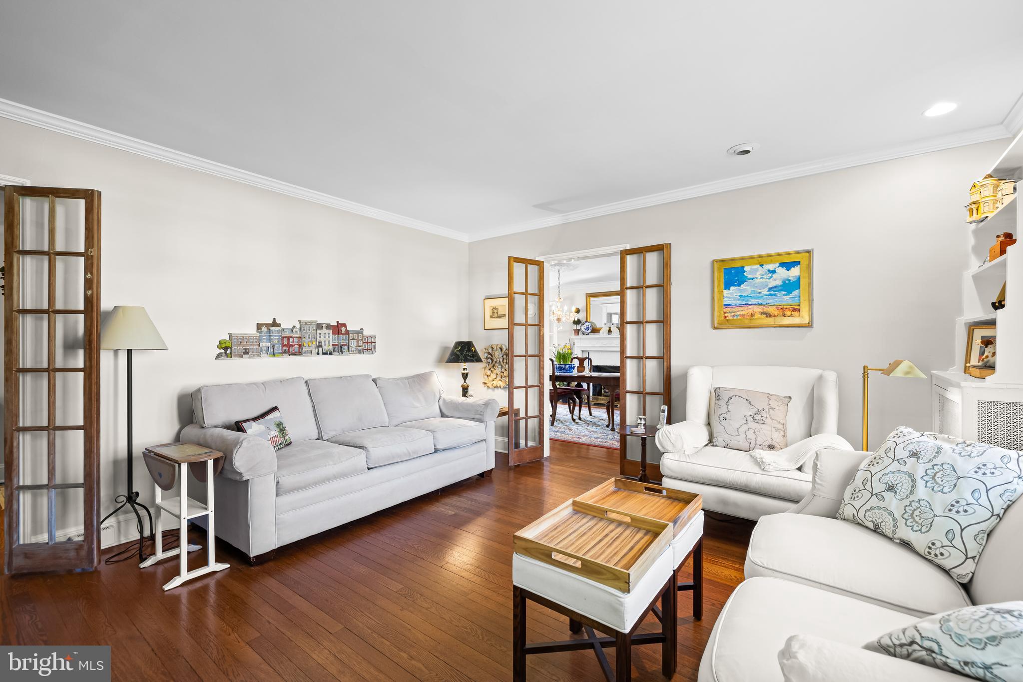 4309 Wendover Road Baltimore, MD 21218 - Photo 22 of 56 a living room with furniture and a wooden floor