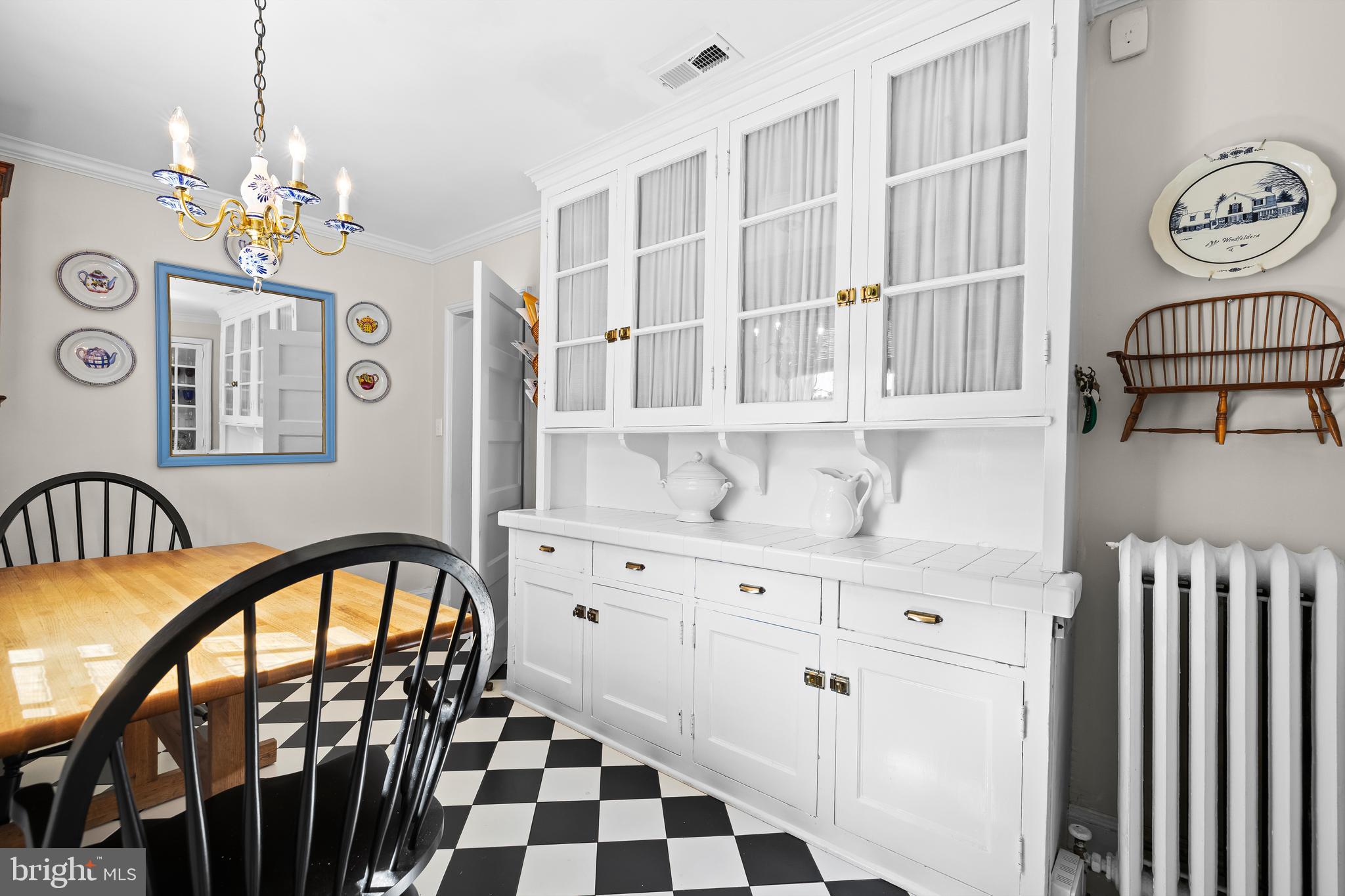 4309 Wendover Road Baltimore, MD 21218 - Photo 24 of 56 a view of a entryway with furniture and chandelier