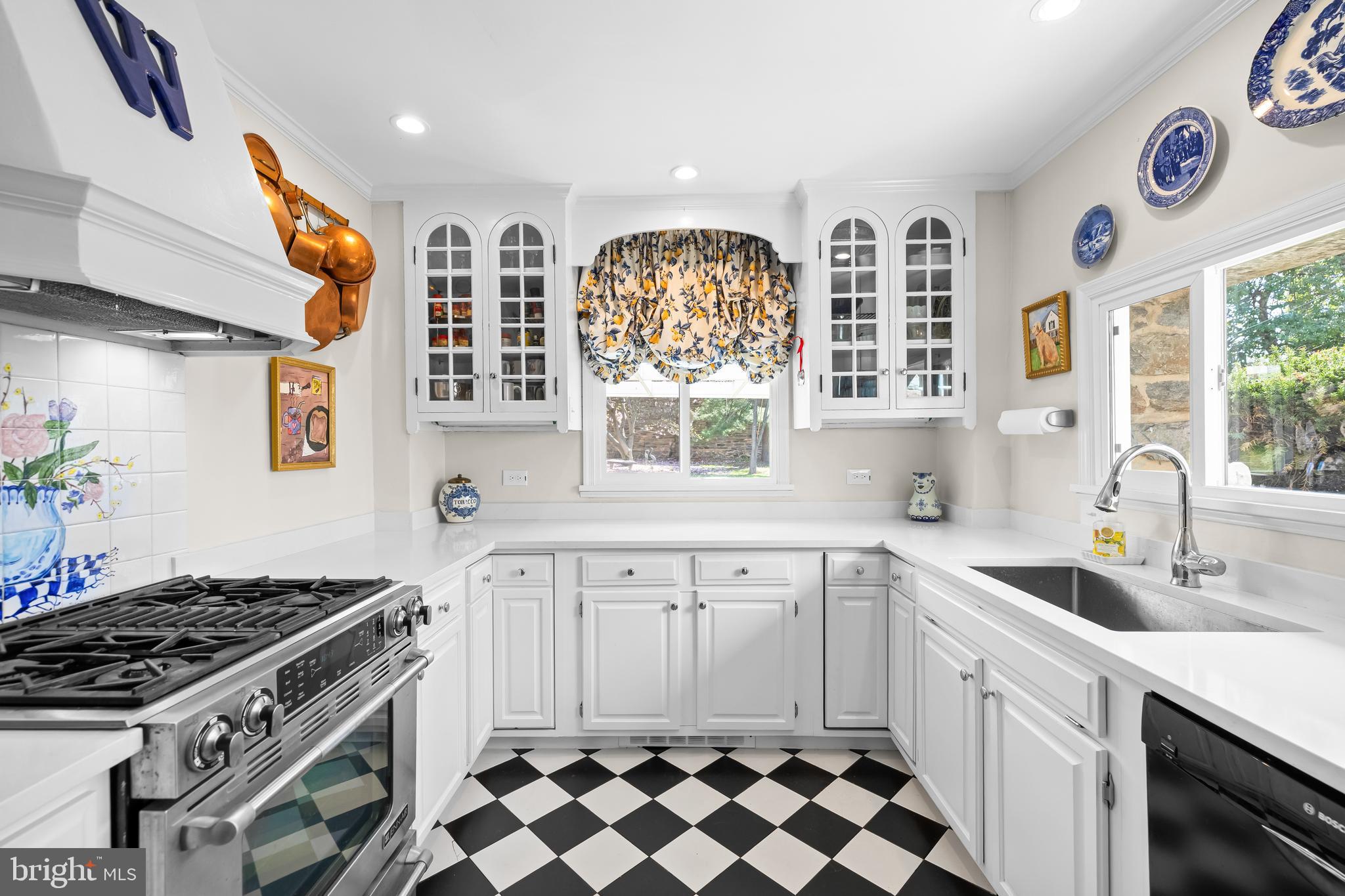 4309 Wendover Road Baltimore, MD 21218 - Photo 26 of 56 a kitchen with stainless steel appliances a stove a sink and a microwave