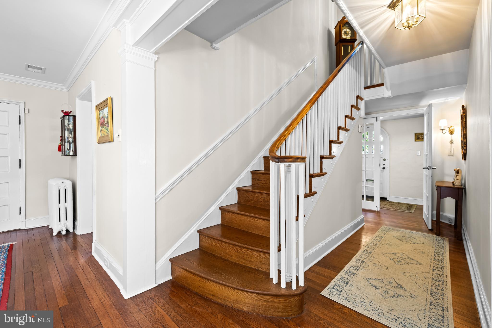 4309 Wendover Road Baltimore, MD 21218 - Photo 30 of 56 a view of entryway and hall with wooden floor