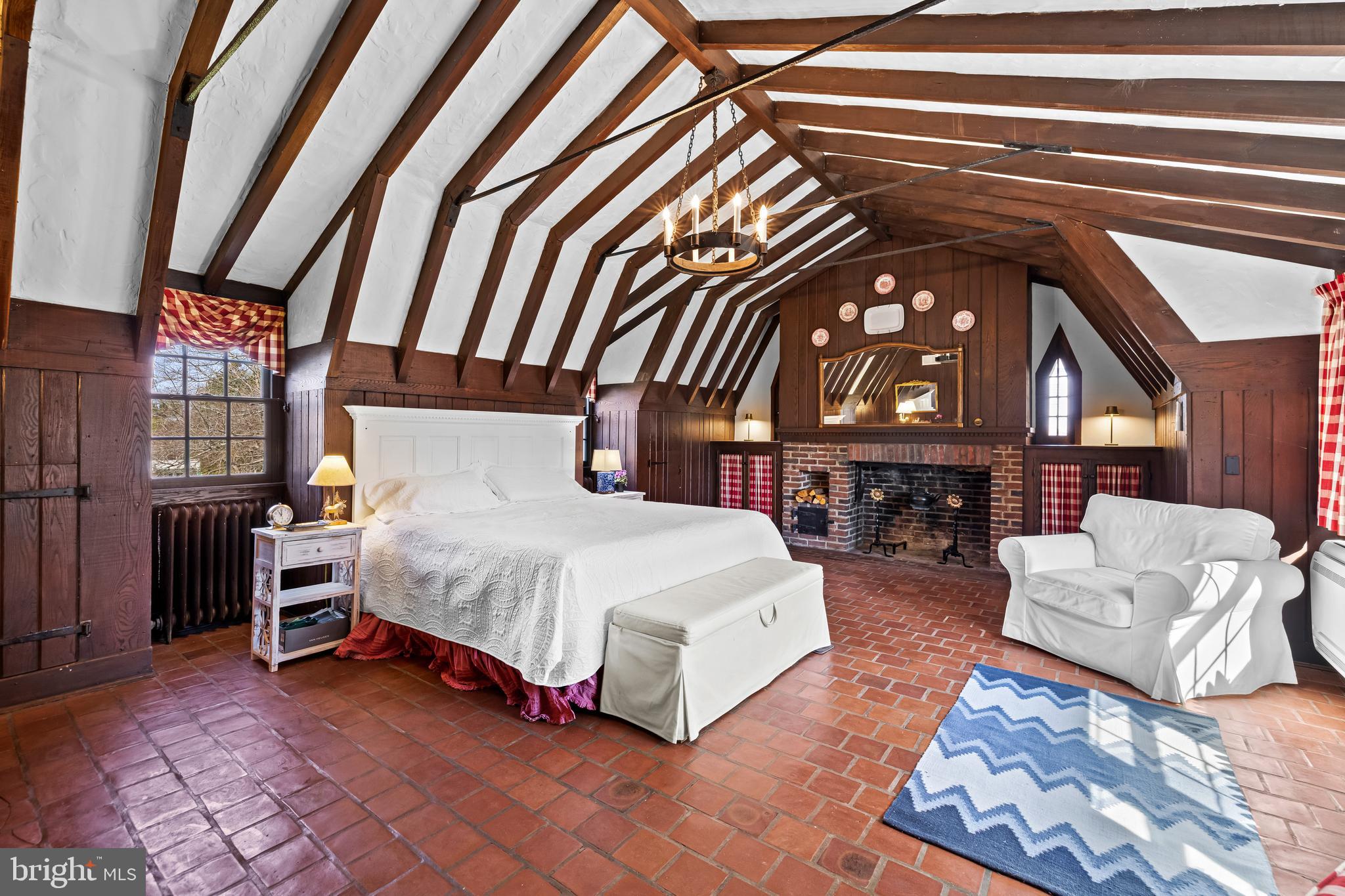 4309 Wendover Road Baltimore, MD 21218 - Photo 38 of 56 a bed room with a bed and a chair