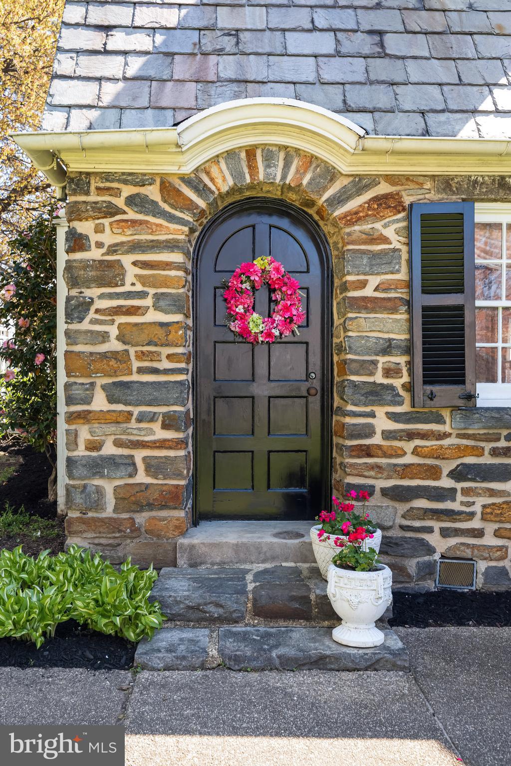 4309 Wendover Road Baltimore, MD 21218 - Photo 8 of 56 a front view of a house with a yard