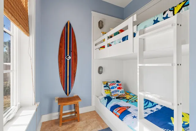 a room with toys and a wooden floor