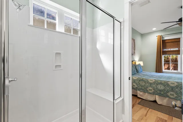 a view of a bedroom from a hallway