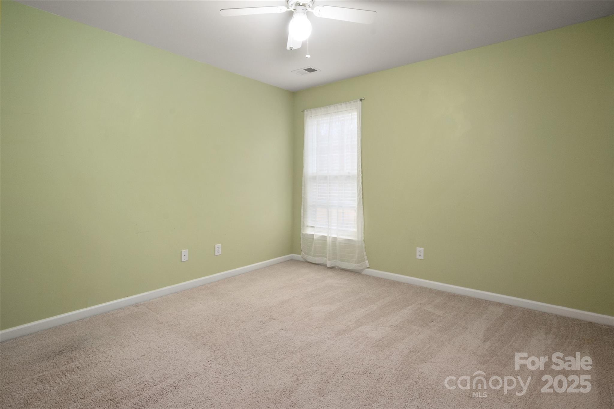 2223 Blueberry Ridge Road Matthews, NC 28105 - Photo 18 of 25 a view of an empty room with a window