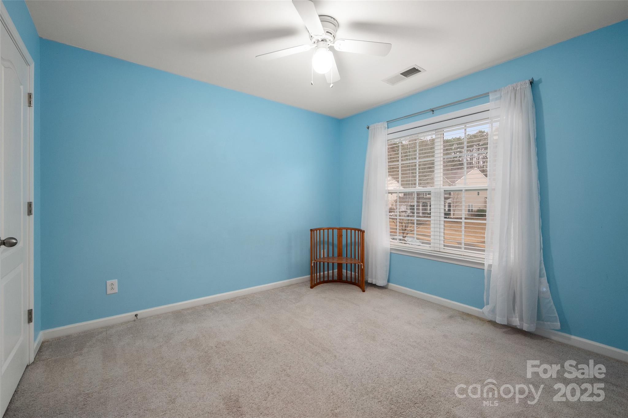 2223 Blueberry Ridge Road Matthews, NC 28105 - Photo 19 of 25 an empty room with a window
