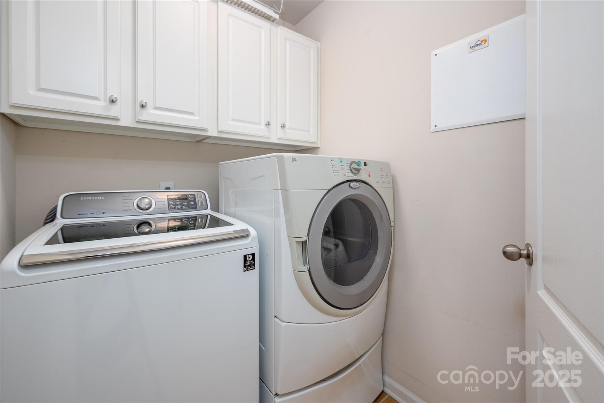 2223 Blueberry Ridge Road Matthews, NC 28105 - Photo 21 of 25 a utility room with dryer and washer