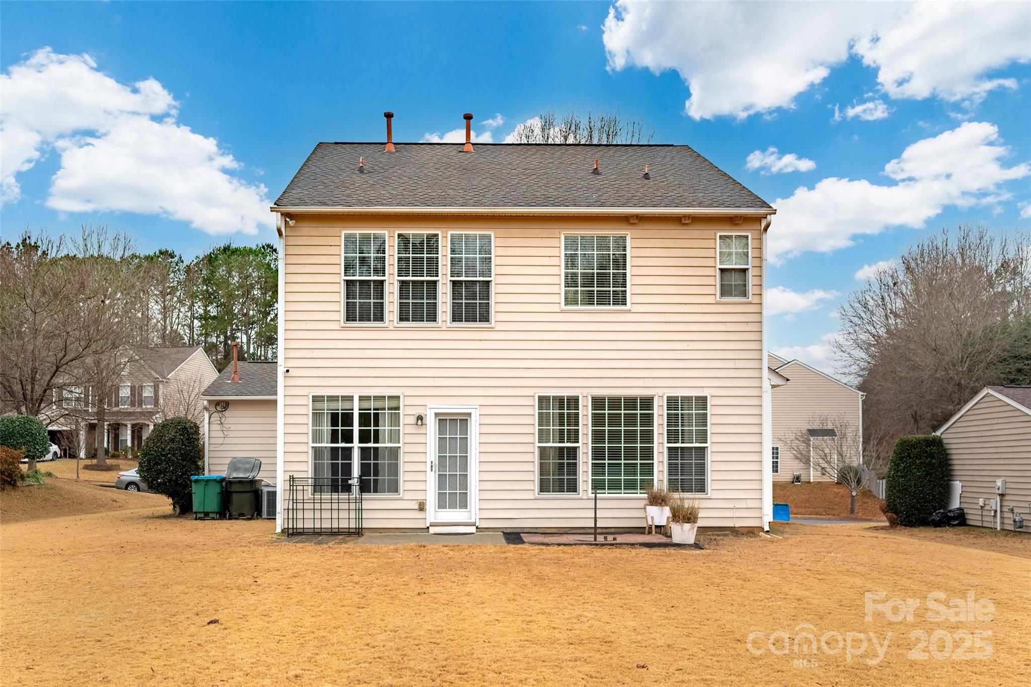 2223 Blueberry Ridge Road Matthews, NC 28105 - Photo 25 of 25 a front view of a house with a yard