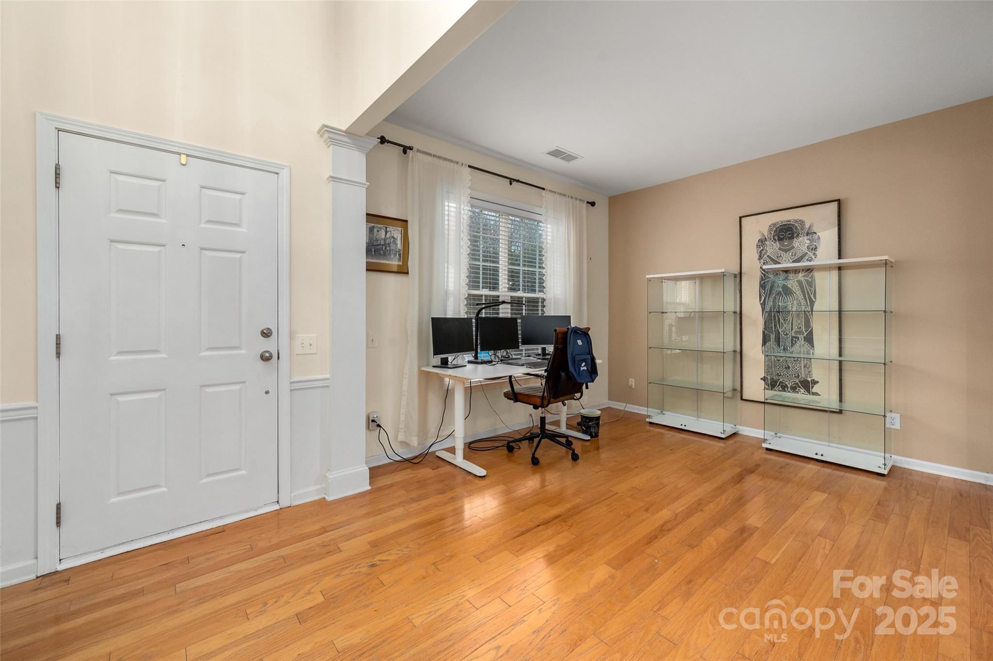 2223 Blueberry Ridge Road Matthews, NC 28105 - Photo 4 of 25 a view of a livingroom with workspace and a window