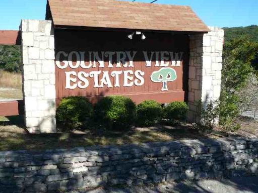 17550 County Road 175 Helotes, TX 78023 - Photo 16 of 16 a sign that is on the side of the road