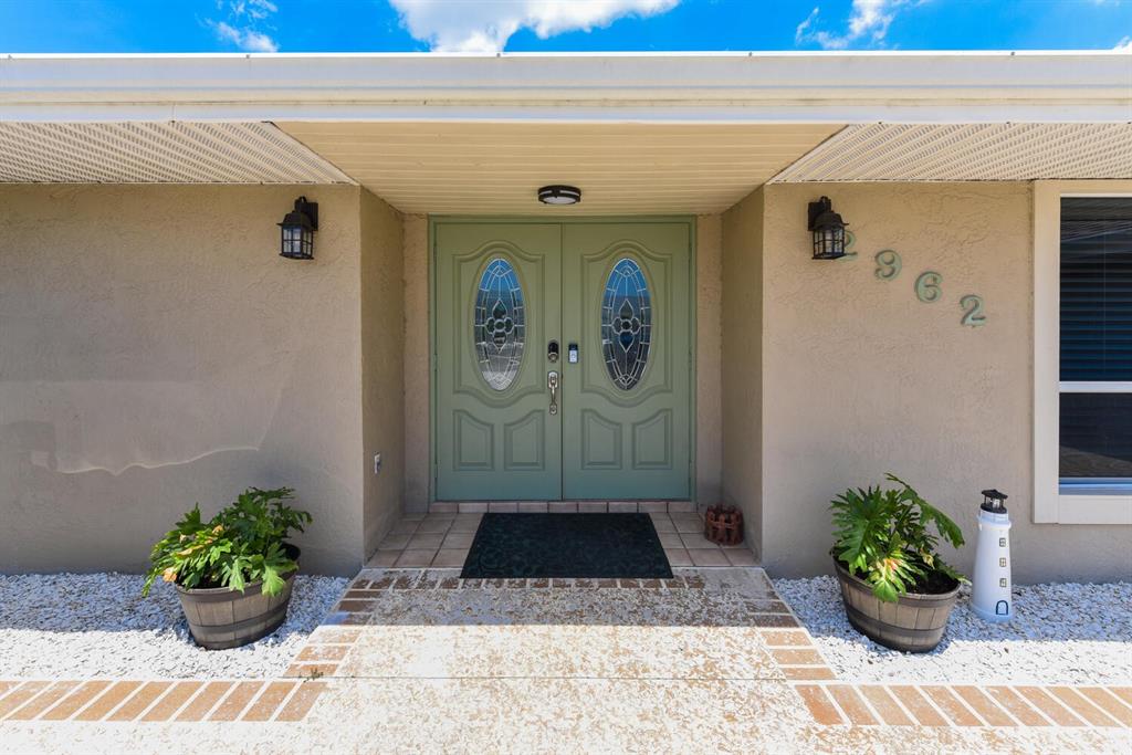 2962 Southeast Darien Road Port St. Lucie, FL 34952 - Photo 6 of 33 a view of a entryway door of the house
