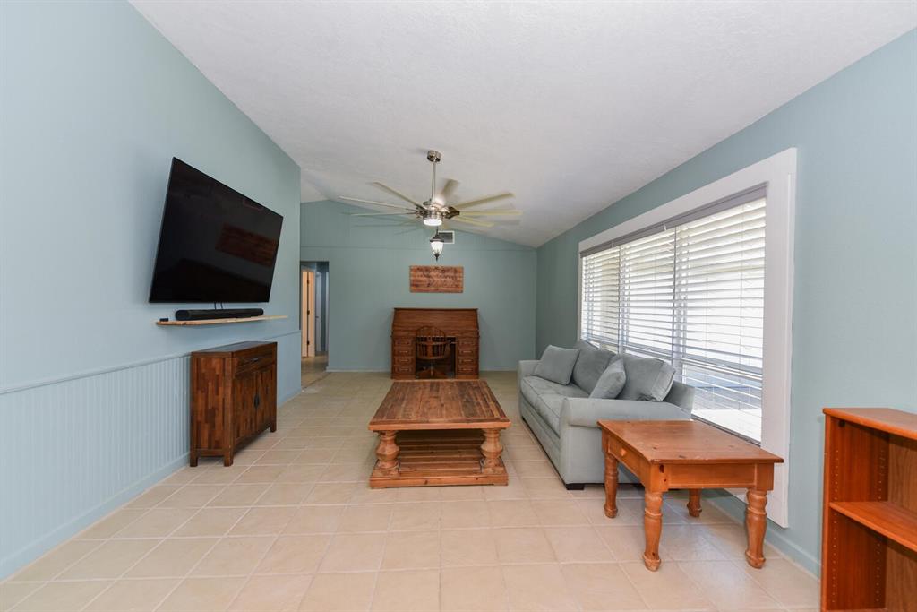 2962 Southeast Darien Road Port St. Lucie, FL 34952 - Photo 8 of 33 a living room with furniture and a flat screen tv