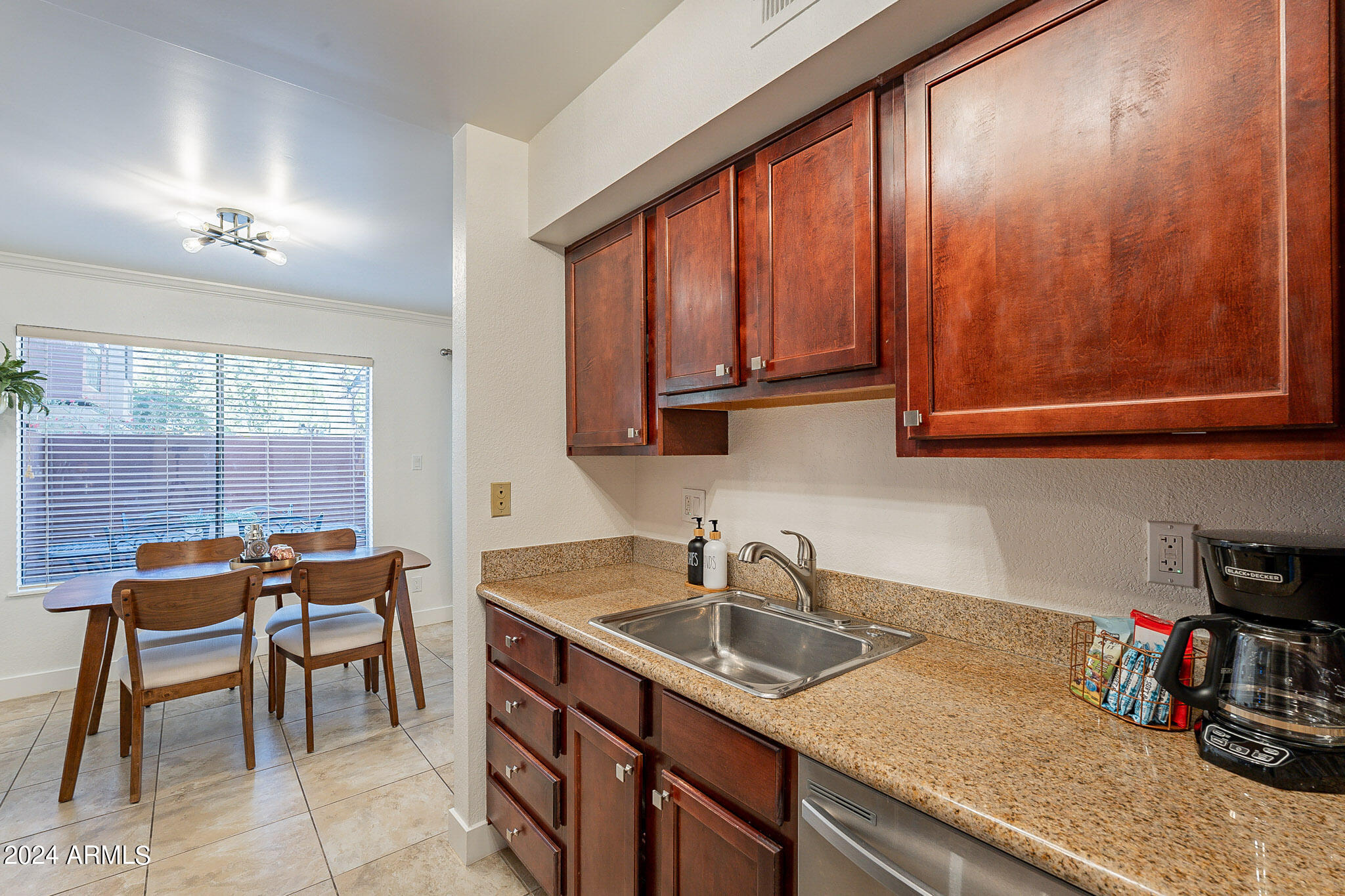 3500 North Hayden Road, Unit 1005 Scottsdale, AZ 85251 - Photo 11 of 51 a kitchen with a sink and cabinets