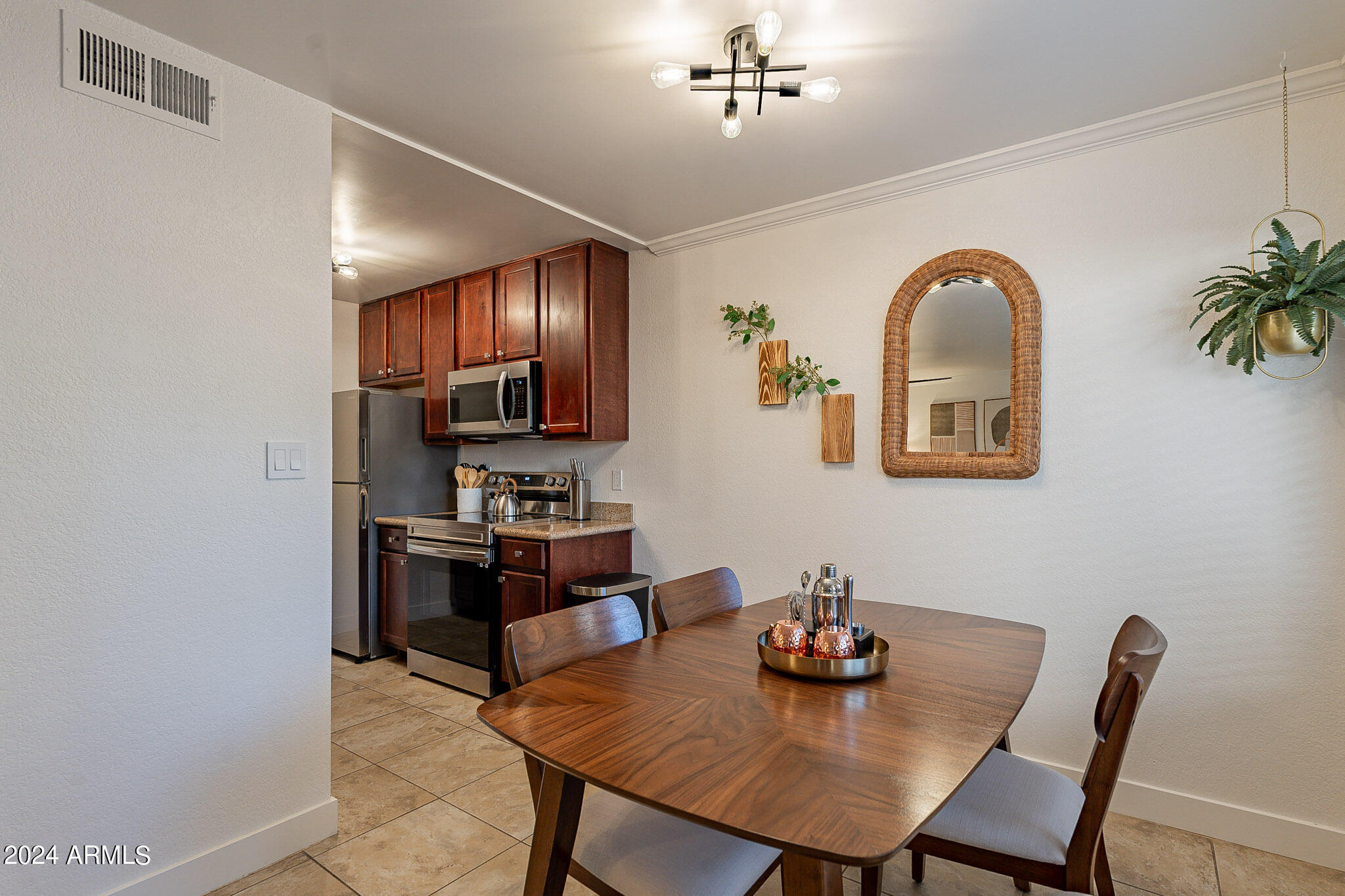 3500 North Hayden Road, Unit 1005 Scottsdale, AZ 85251 - Photo 12 of 51 a view of a dining room with furniture